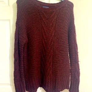 Burgundy colored AE sweater. Size M. Good condition.